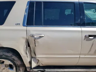 2015 Chevrolet Suburban LTZ with VIN 1GNSCKKC6FR705660, listed as a Copart auction lot 60328685 with 174,247 mi miles and Salvage title. Bid and sale history available at DreamBid. Image 11.