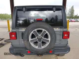 2019 Jeep Wrangler Unlimited Sahara with VIN 1C4HJXEN0KW540591, listed as a IAAI auction lot 42076235 with 41,016 mi miles and . Bid and sale history available at DreamBid. Image 17.