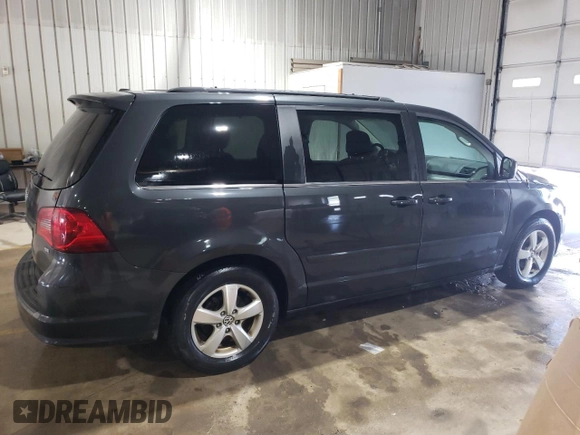 2011 Volkswagen Routan SE with VIN 2V4RW3DG2BR738704, listed as a Copart auction lot 58767625 with 116,886 mi miles and Salvage title. Bid and sale history available at DreamBid. Image 3.