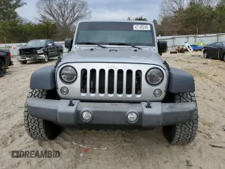 2015 Jeep Wrangler Unlimited Willys Wheeler with VIN 1C4BJWDG4FL723924, listed as a Copart auction lot 47145245 with 166,256 mi miles and Salvage Title. Bid and sale history available at DreamBid. Image 5.