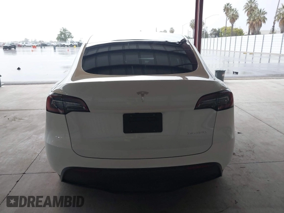 2023 Tesla Model Y Long Range z VIN 7SAYGDEE2PF834036, wystawiony jako IAAI lot #41933120 z przebiegiem 27 872 mil mil oraz . Historia ofert i sprzedaży dostępna na DreamBid. Obrazek 17.