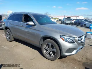 2019 Mercedes-Benz GLC with VIN WDC0G4KB0KF669283, listed as a IAAI auction lot 41696134 with 64,956 mi miles. Bid and sale history available at carsss.com. Image 1.