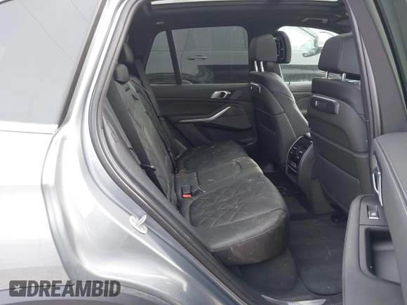 2025 BMW X5 xDrive40i with VIN 5UX23EU02S9X44610, listed as a IAAI auction lot 41469794 with 1,964 mi miles. Bid and sale history available at carsss.com. Image 8.