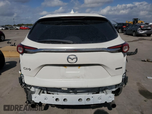 2021 Mazda CX-9 Grand Touring with VIN JM3TCADY2M0519977, listed as a Copart auction lot 76137724 with 31,306 mi miles and Salvage title. Bid and sale history available at DreamBid. Image 6.