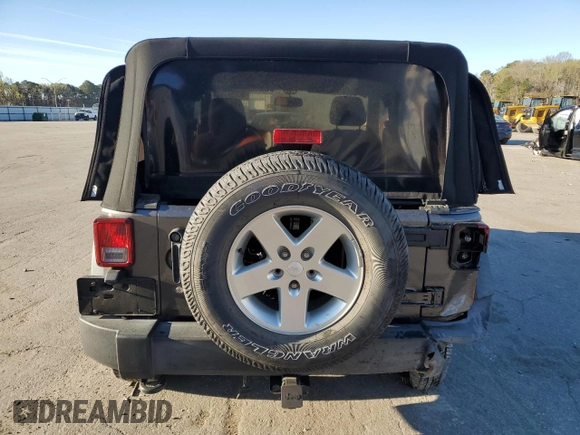 2016 Jeep Wrangler Willys Wheeler with VIN 1C4AJWAG5GL266235, listed as a Copart auction lot 50237195 with 60,830 mi miles and Salvage title. Bid and sale history available at DreamBid. Image 6.