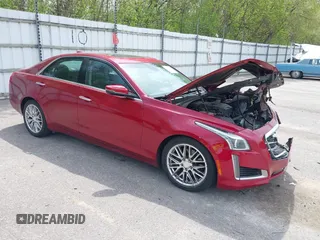 2015 Cadillac CTS Luxury AWD z VIN 1G6AX5SX5F0129130, wystawiony jako IAAI lot #42147471 z przebiegiem 93 678 mil mil oraz . Historia ofert i sprzedaży dostępna na DreamBid. Obrazek 1.