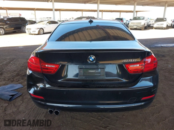 2015 BMW 4 Series 428i with VIN WBA3N3C55FK232613, listed as a IAAI auction lot 41865898 with 104,585 mi miles and . Bid and sale history available at carsss.com. Image 16.