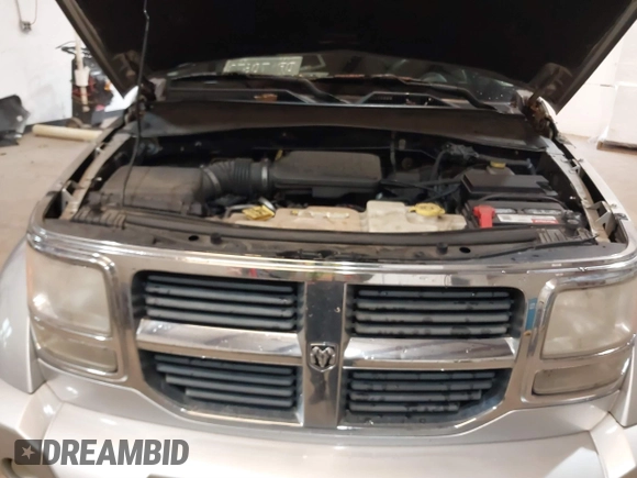 2007 Dodge Nitro SLT z VIN 1D8GU58K97W616455, wystawiony jako IAAI lot #41229813 z przebiegiem 199 421 mil mil oraz . Historia ofert i sprzedaży dostępna na DreamBid. Obrazek 10.