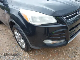 2013 Ford Escape SEL with VIN 1FMCU9H97DUA80867, listed as a IAAI auction lot 42709994 with Not provided miles and . Bid and sale history available at DreamBid. Image 6.