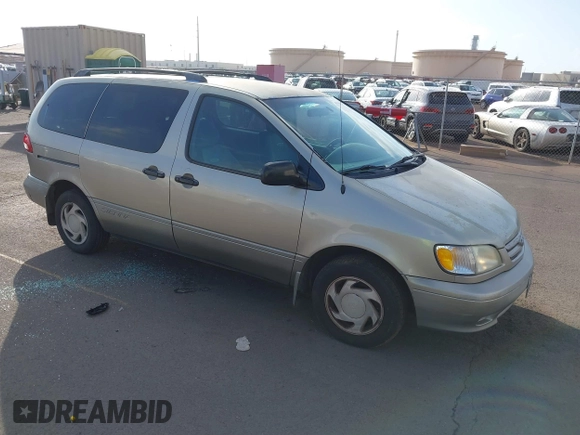 2002 Toyota Sienna LE with VIN 4T3ZF13C82U457803, listed as a IAAI auction lot 41198246 with 185,445 mi miles and . Bid and sale history available at DreamBid. Image 1.