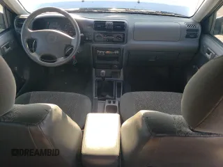 2001 Isuzu Rodeo S with VIN 4S2CK58W914331185, listed as a Copart auction lot 43748225 with 138,882 mi miles and Salvage Title. Bid and sale history available at DreamBid. Image 8.