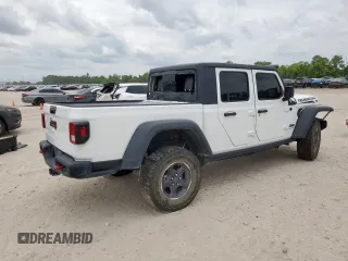 2023 Jeep Gladiator Rubicon with VIN 1C6JJTBG8PL532271, listed as a Copart auction lot 58220565 with 34,172 mi miles and Salvage title. Bid and sale history available at DreamBid. Image 3.