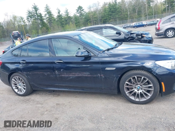 2014 BMW 5 Series 535i Gran Turismo xDrive with VIN WBA5M4C52ED183844, listed as a IAAI auction lot 42227214 with 104,098 mi miles and . Bid and sale history available at DreamBid. Image 6.
