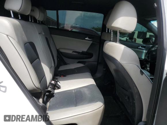 2019 Kia Sportage EX z VIN KNDPNCAC7K7522953, wystawiony jako Copart lot #54906835 z przebiegiem 128 011 mil mil oraz Szkoda całkowita • Salvage title. Historia ofert i sprzedaży dostępna na DreamBid. Obrazek 11.
