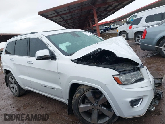 2014 Jeep Grand Cherokee Overland with VIN 1C4RJFCG9EC162098, listed as a IAAI auction lot 41746022 with 120,588 mi miles and . Bid and sale history available at DreamBid. Image 12.