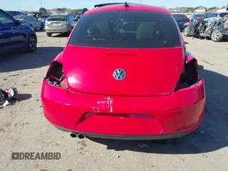 2013 Volkswagen Beetle 2.5L w/Sun/Sound/Nav with VIN 3VWJX7AT0DM673162, listed as a IAAI auction lot 41336320 with Not Provided miles and . Bid and sale history available at DreamBid. Image 16.