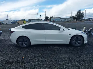 2018 Tesla Model 3 Long Range Battery with VIN 5YJ3E1EA3JF013253, listed as a IAAI auction lot 41752102 with 84,459 mi miles. Bid and sale history available at carsss.com. Image 13.