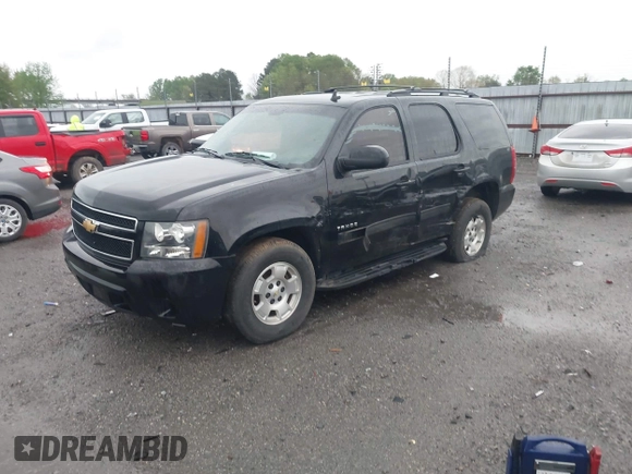 2013 Chevrolet Tahoe LS with VIN 1GNSCAE07DR223062, listed as a IAAI auction lot 41948276 with 196,616 mi miles and . Bid and sale history available at DreamBid. Image 2.