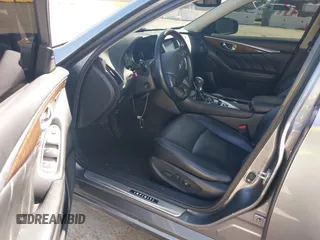 2014 Infiniti Q50 Premium with VIN JN1BV7AP5EM672766, listed as a IAAI auction lot 42107952 with 66,929 mi miles. Bid and sale history available at carsss.com. Image 5.