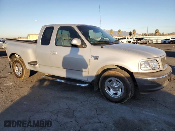 2001 Ford F-150 XL with VIN 2FTRX07L51CA91232, listed as a Copart auction lot 88556635 with 268,582 mi miles and Salvage Title. Bid and sale history available at carsss.com. Image 4.