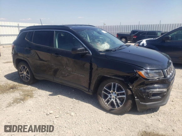 2018 Jeep Compass Altitude with VIN 3C4NJDBBXJT493439, listed as a Copart auction lot 58664835 with 96,928 mi miles and Salvage title. Bid and sale history available at DreamBid. Image 4.