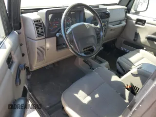 2004 Jeep Wrangler Sahara with VIN 1J4FA59SX4P718591, listed as a Copart auction lot 59907805 with 241,994 mi miles and Clean title. Bid and sale history available at DreamBid. Image 8.