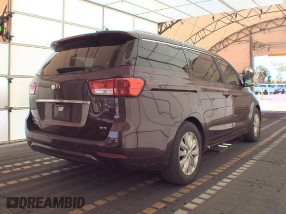 2016 Kia Sedona SX with VIN KNDMC5C1XG6140641, listed as a Copart auction lot 54801215 with 185,471 mi miles and Clean Title. Bid and sale history available at carsss.com. Image 4.