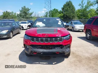 2025 Jeep Compass Trailhawk with VIN 3C4NJDDNXST551154, listed as a IAAI auction lot 42573595 with 4,392 mi miles and . Bid and sale history available at DreamBid. Image 12.