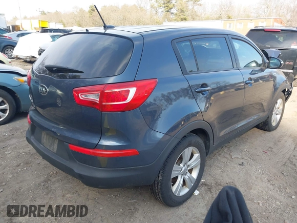 2013 Kia Sportage LX z VIN KNDPBCA2XD7428262, wystawiony jako IAAI lot #41793737 z przebiegiem 82 853 mil mil oraz . Historia ofert i sprzedaży dostępna na DreamBid. Obrazek 4.