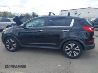 2013 Kia Sportage SX with VIN KNDPCCA61D7385219, listed as a IAAI auction lot 41945345 with 112,471 mi miles and . Bid and sale history available at carsss.com. Image 14.