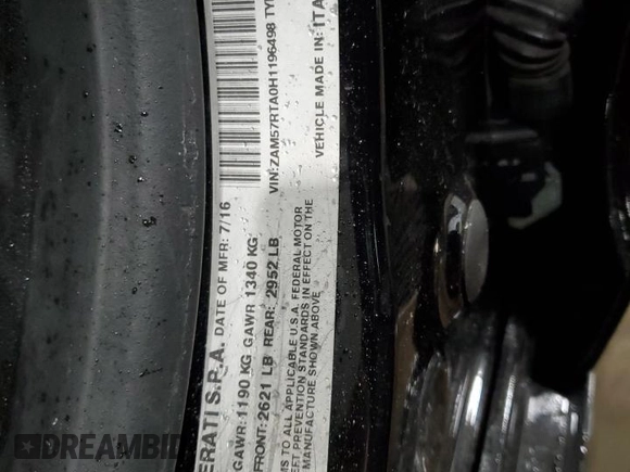 2017 Maserati Ghibli S Q4 z VIN ZAM57RTA0H1196498, wystawiony jako Copart lot #79911364 z przebiegiem 69 950 mil mil oraz Szkody całkowita. Historia ofert i sprzedaży dostępna na DreamBid. Obrazek 14.
