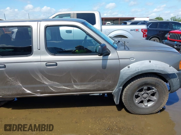 2003 Nissan Frontier XE with VIN 1N6ED29X73C424295, listed as a IAAI auction lot 42622922 with 200,599 mi miles and . Bid and sale history available at DreamBid. Image 14.