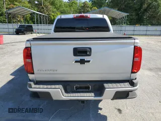 2016 Chevrolet Colorado 4WD Z71 with VIN 1GCGTDE33G1170065, listed as a Copart auction lot 55920665 with 135,410 mi miles and Salvage title. Bid and sale history available at DreamBid. Image 6.