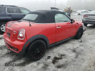 2015 MINI Roadster S z VIN WMWSY3C58FT567023, wystawiony jako Copart lot #43289505 z przebiegiem 115 029 mil mil oraz Szkoda całkowita • Salvage title. Historia ofert i sprzedaży dostępna na DreamBid. Obrazek 3.