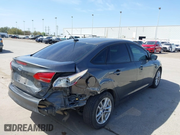 2018 Ford Focus SE with VIN 1FADP3F2XJL302358, listed as a IAAI auction lot 41807622 with 76,145 mi miles. Bid and sale history available at carsss.com. Image 4.