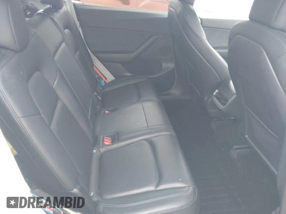 2021 Tesla Model Y Long Range with VIN 5YJYGDEE7MF198867, listed as a IAAI auction lot 42117463 with 79,759 mi miles and . Bid and sale history available at DreamBid. Image 8.