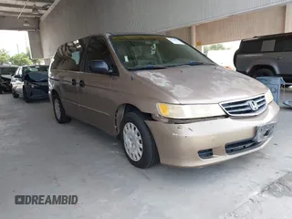 2003 Honda Odyssey LX with VIN 5FNRL18523B097910, listed as a IAAI auction lot 42536971 with 180,915 mi miles and . Bid and sale history available at DreamBid. Image 1.