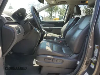 2014 Honda Odyssey EX-L with VIN 5FNRL5H62EB021297, listed as a Copart auction lot 57177375 with 206,641 mi miles and Clean title. Bid and sale history available at DreamBid. Image 7.