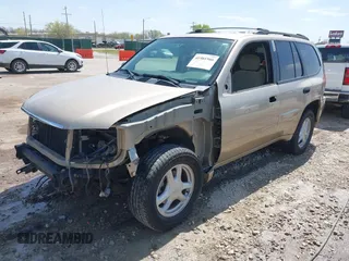 2005 GMC Envoy SLE with VIN 1GKDT13S252264932, listed as a IAAI auction lot 41981566 with 140,566 mi miles. Bid and sale history available at carsss.com. Image 18.