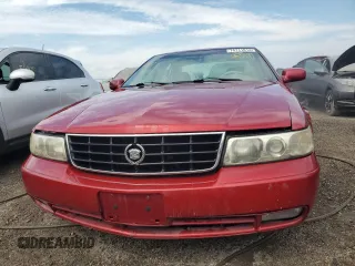 1999 Cadillac Seville Touring STS z VIN 1G6KY5496XU926352, wystawiony jako Copart lot #74711014 z przebiegiem 140 915 mil mil oraz Nie do naprawy • Non repairable. Historia ofert i sprzedaży dostępna na DreamBid. Obrazek 5.