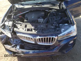 2015 BMW X4 xDrive28i with VIN 5UXXW3C59F0M88054, listed as a Copart auction lot 40534343 with 69,369 mi miles. Bid and sale history available at carsss.com. Image 11.