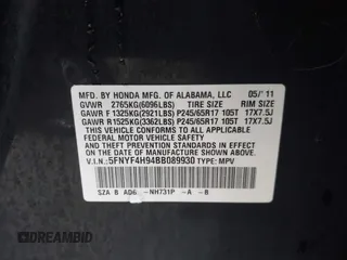 2011 Honda Pilot Touring with VIN 5FNYF4H94BB089930, listed as a IAAI auction lot 41477596 with 171,831 mi miles. Bid and sale history available at carsss.com. Image 9.