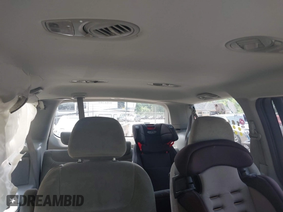 2007 Honda Odyssey LX with VIN 5FNRL38267B029066, listed as a IAAI auction lot 42502433 with 185,721 mi miles and . Bid and sale history available at DreamBid. Image 8.
