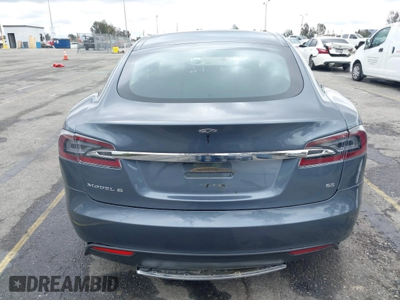 2013 Tesla Model S with VIN 5YJSA1CN8DFP21869, listed as a IAAI auction lot 41772603 with Not provided miles and . Bid and sale history available at DreamBid. Image 15.