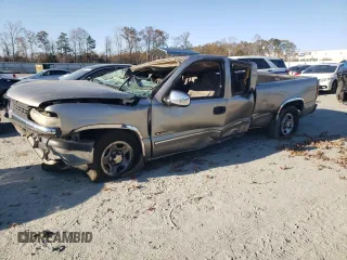 2000 Chevrolet Silverado 1500 LS with VIN 2GCEC19V3Y1241827, listed as a Copart auction lot 83176464 with 0 mi miles and Salvage Title. Bid and sale history available at carsss.com. Image 1.