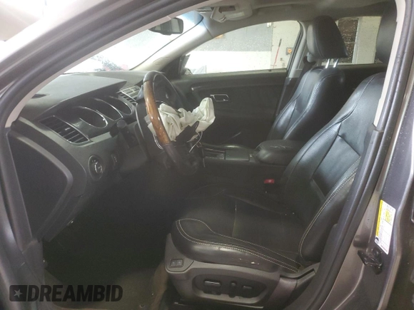 2012 Ford Taurus Limited with VIN 1FAHP2FW3CG113920, listed as a Copart auction lot 55565615 with 131,981 mi miles and Salvage title. Bid and sale history available at DreamBid. Image 7.