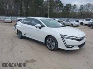 2018 Honda Clarity Plug-In Hybrid Touring with VIN JHMZC5F38JC001442, listed as a IAAI auction lot 41848328 with 99,156 mi miles. Bid and sale history available at carsss.com. Image 1.