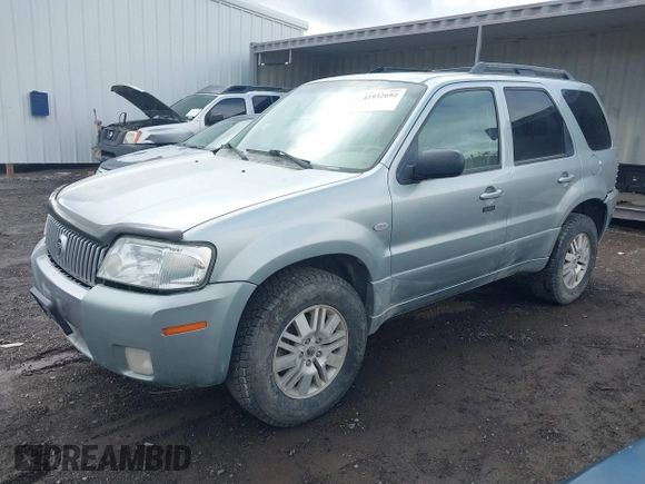 2005 Mercury Mariner Luxury with VIN 4M2CU57145DJ22822, listed as a IAAI auction lot 41932692 with 167,263 mi miles and . Bid and sale history available at DreamBid. Image 2.