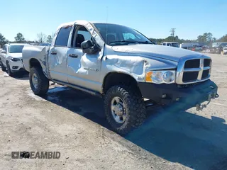 2004 Dodge Ram 2500 SLT with VIN 3D7KU28D64G185341, listed as a IAAI auction lot 41665495 with 243,016 mi miles. Bid and sale history available at carsss.com. Image 1.