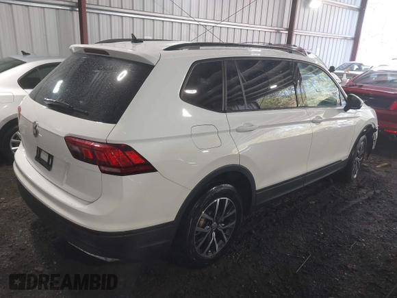 2021 Volkswagen Tiguan S z VIN 3VV1B7AX6MM081755, wystawiony jako IAAI lot #41864918 z przebiegiem 40 406 mil mil oraz . Historia ofert i sprzedaży dostępna na DreamBid. Obrazek 4.